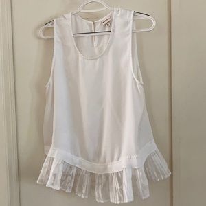 Lightweight sleeveless dressy top.